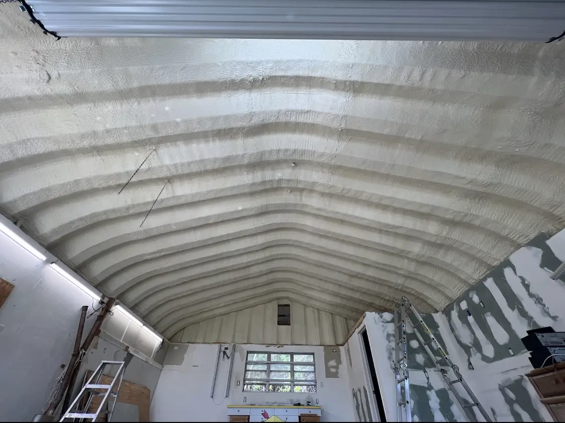 Spray polyurethane foam applied to the underside of a metal roof deck in Signal Mountain